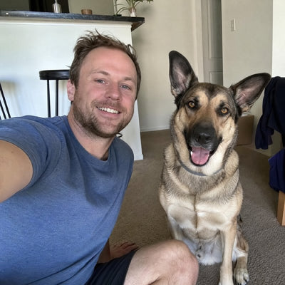 Mike T. and Bella, his German Shepherd mix in a grey CollarZen collar