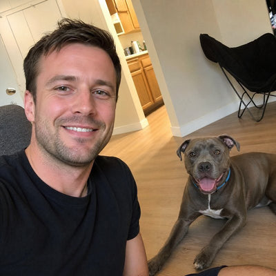Jack A. from Detroit, MI with their dog wearing a CollarZen collar